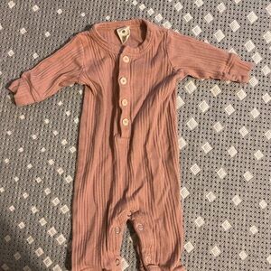 Kate Quinn pinkish One Piece outfit